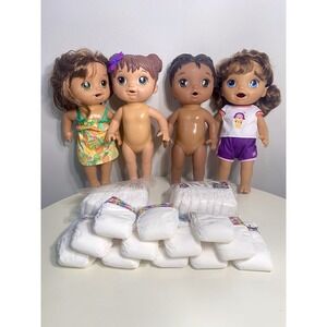 4 Baby Alive Dolls - 28 Diapers - Clothing Lot